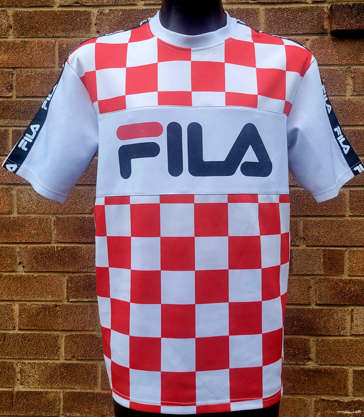 FILA Black Line checkerboard T-shirt in red and white featuring an oversized FILA chest logo, branded sleeve taping and crew neck in a men's medium.