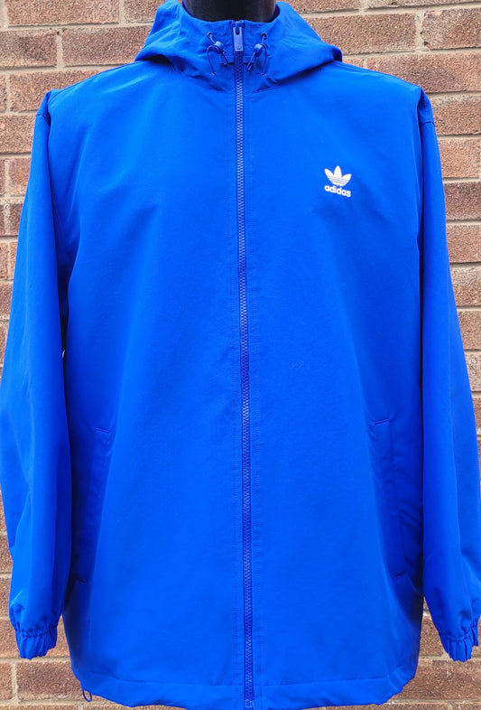 Adidas royal blue full zip windbreaker jacket side zipped pockets large trefoil logo on the back 