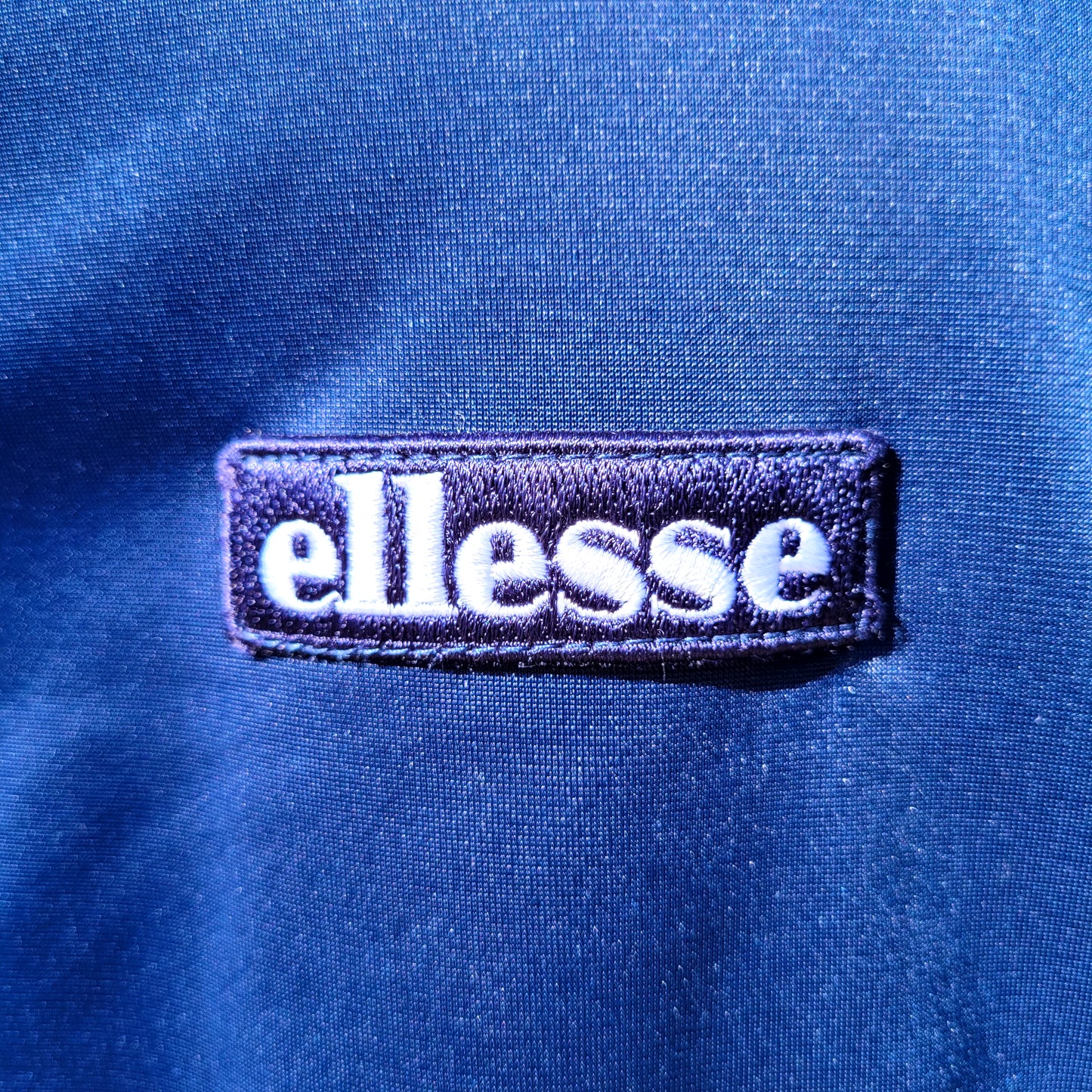 Ellesse Navy Track Top, Branded Logo Tape Sleeve and Zip Pull, Retro Terrace Jacket Size: Small